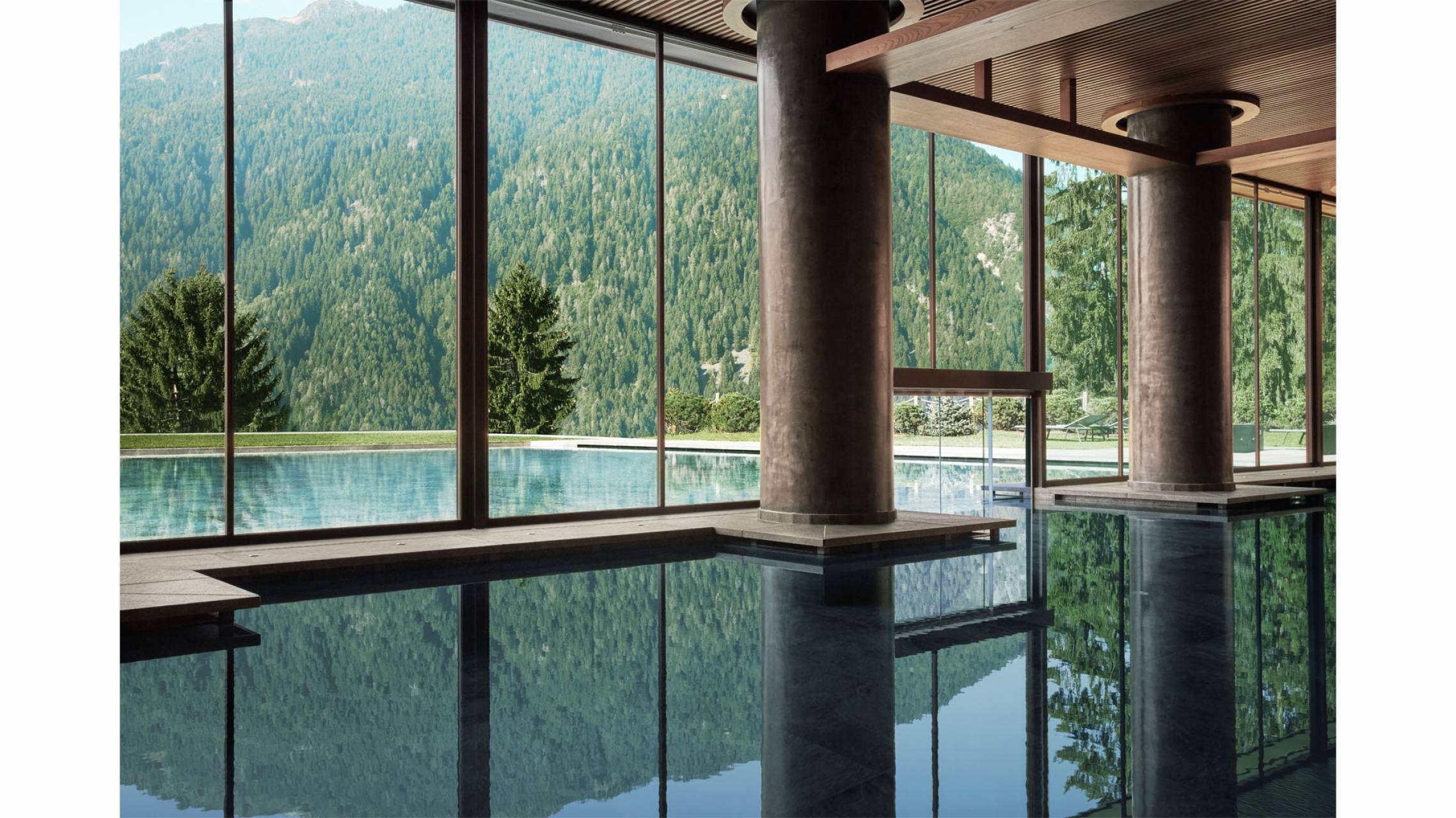 Indoor pool with outdoor facility in summer